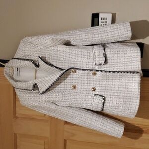 Beautifully detailed white and black trimmed blazer